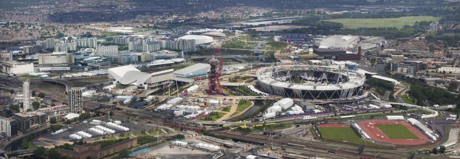 Aerial view of Queen Elizabeth Olympic Park in London, with views of stadium and other amenities.